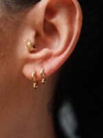 Argola ondulada em ouro 18k da B Gold Joias